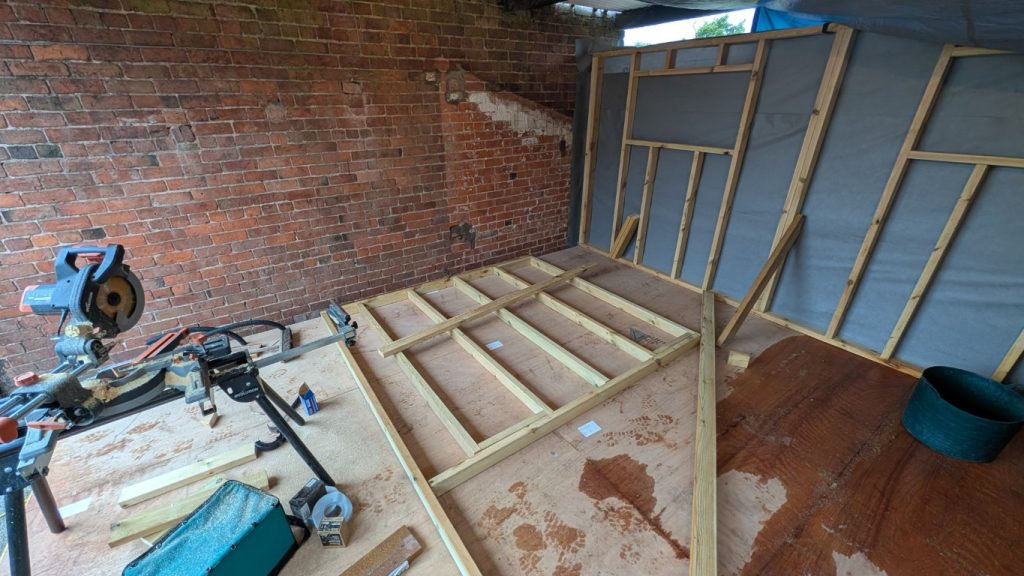 The DIY wall starts to take shape.