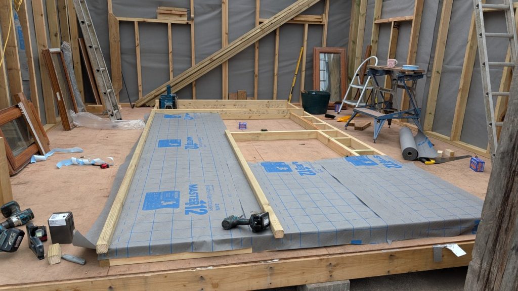 The front frame is nearly ready to complete the walls.